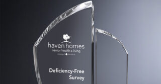 Glass award displaying the Haven Homes Senior Health & Living logo and the words “Deficiency-Free Survey,” recognizing the community’s achievement in quality care and compliance.